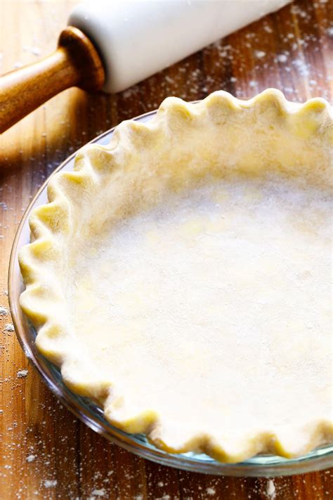 Combine ingredients. In the bowl of a food processor, combine 1 2/3 cups of flour, the sugar, and kosher salt. Pulse 2-3 times to combine. Add the cold butter. Spread the butter chunks evenly over the surface of the dry ingredients. Pulse until the dough begins to collect in clumps, about 23-25 short pulses.